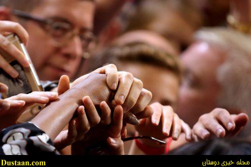 Supporters touch Michelle Obama's hand after she delivers a speech in Winston-Salem. REUTERS/Carlos Barria