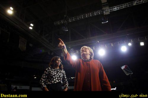 Hillary Clinton reacts as she leaves a campaign rally accompanied by Michelle Obama in Winston-Salem. REUTERS/Carlos Barria