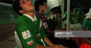 https://media.gettyimages.com/photos/irans-khodadad-azizi-crys-in-the-dug-out-after-his-country-lost-on-picture-id650282708?s=612x612